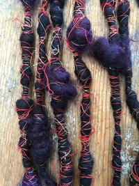 Vesuvius wrapped art yarn coils, 7 yards