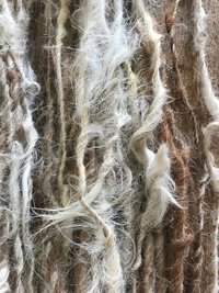 Dreamy “Carlos” suri llama lockspun yarn, 20 yards