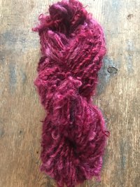 Merrily We Roll Along, burgundy curly 50 yards handspun yarn