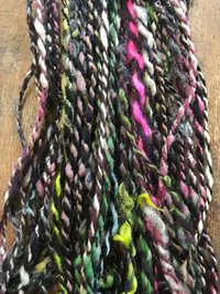 Controlled Chaos, smoked plum edition: 50 yards bulky art yarn