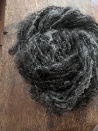 Charcoal grey Lincoln wool yarn, lockspun curly art yarn
