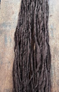Dark brown Falkland wool, handspun bulky weight. Soft and squishy
