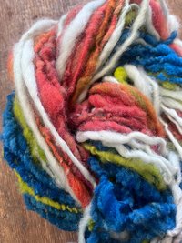 Bravissima 60 yards wild bright textured handspun art yarn