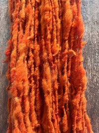 Pumpkin Orange, handspun nubbly squishy chunky handspun Southdown wool art yarn