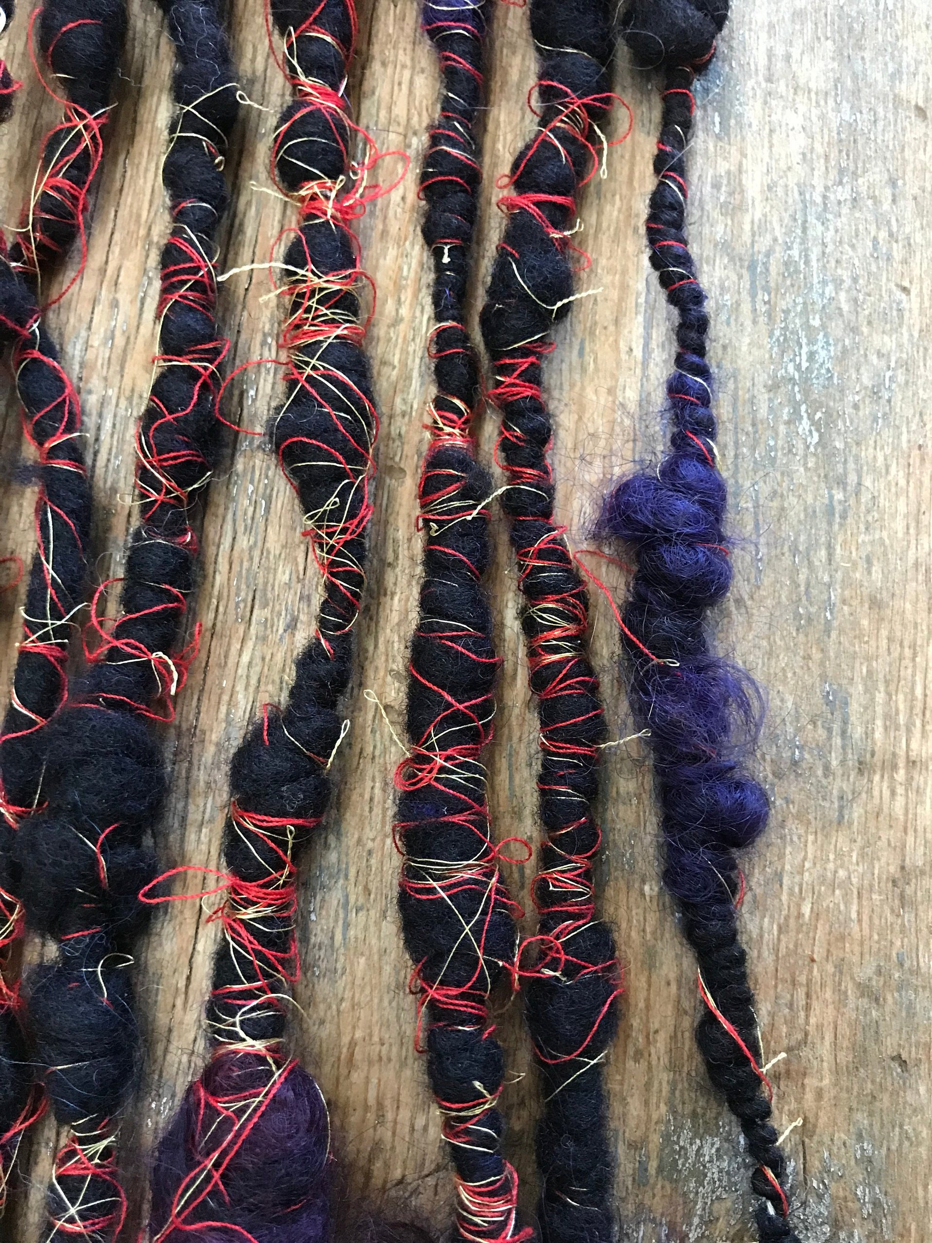 Vesuvius wrapped art yarn coils, 7 yards