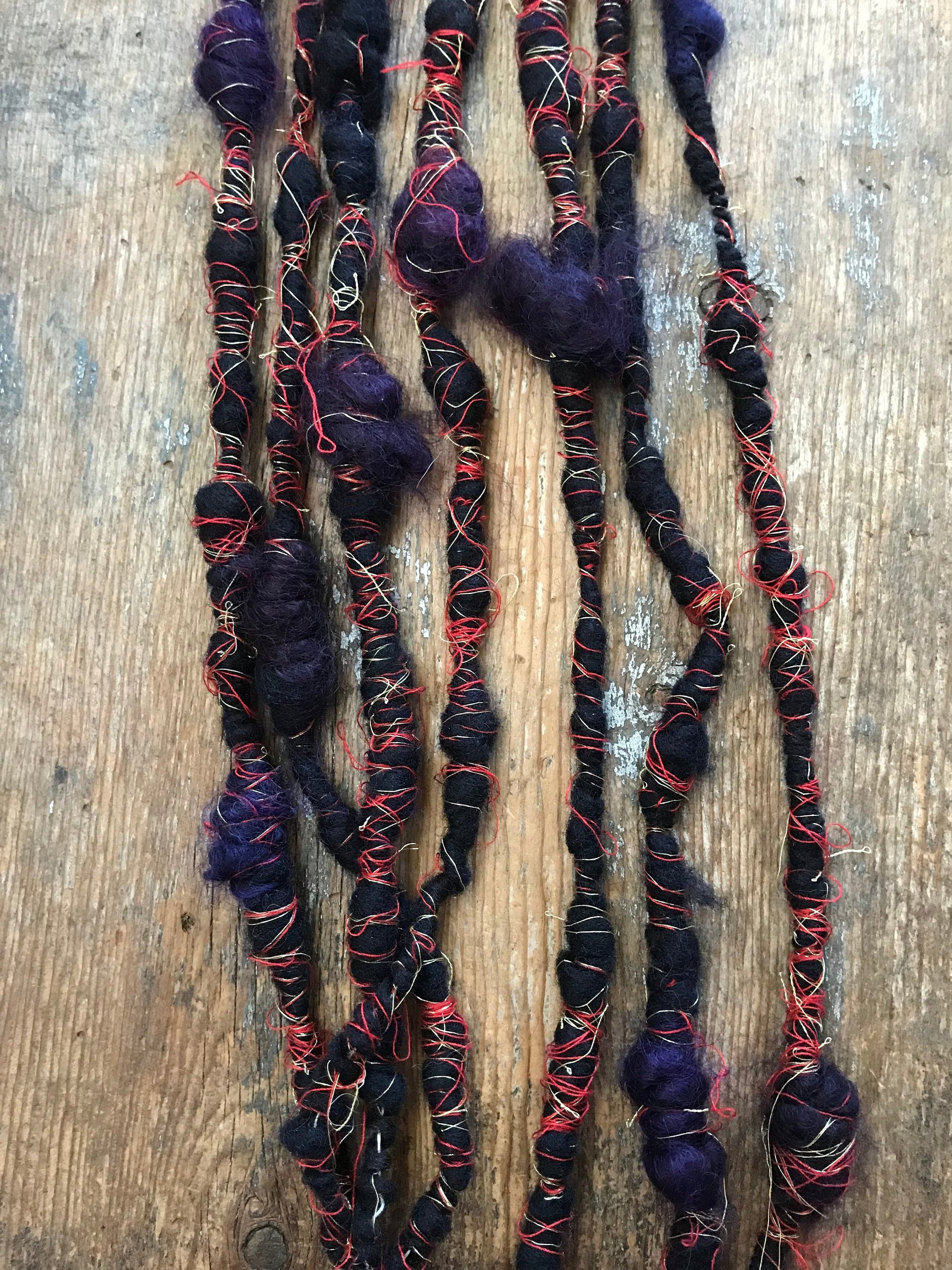 Vesuvius wrapped art yarn coils, 7 yards