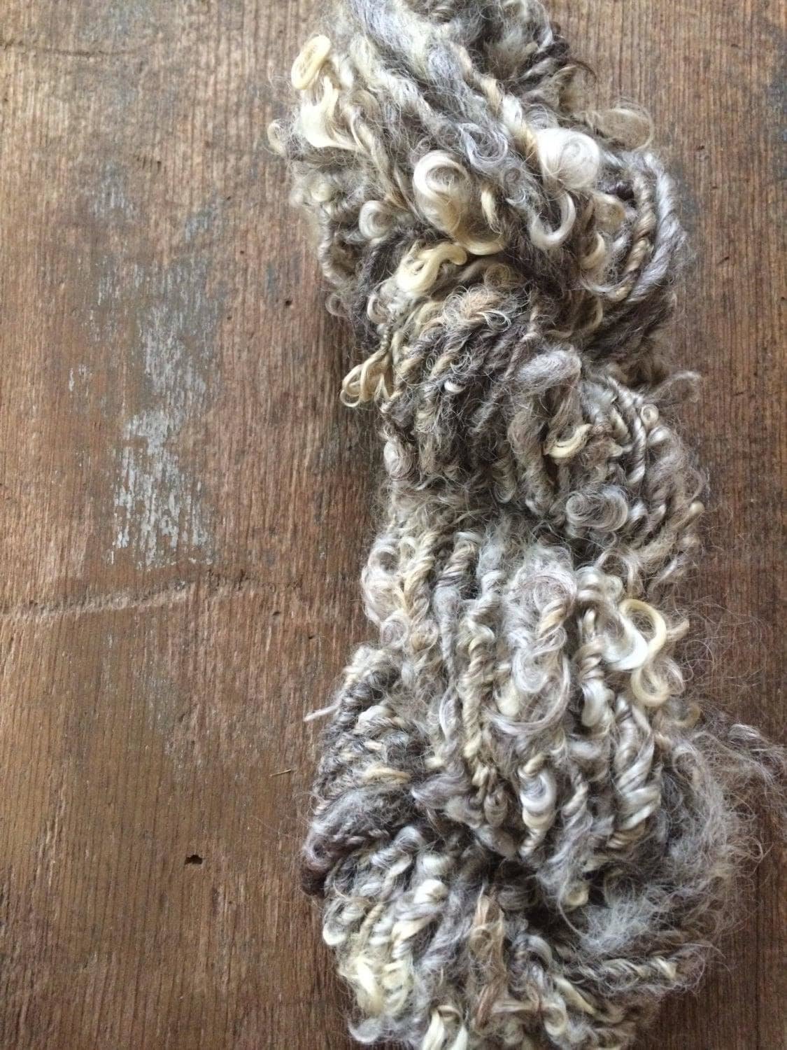 Grey curly yarn, 20 yards