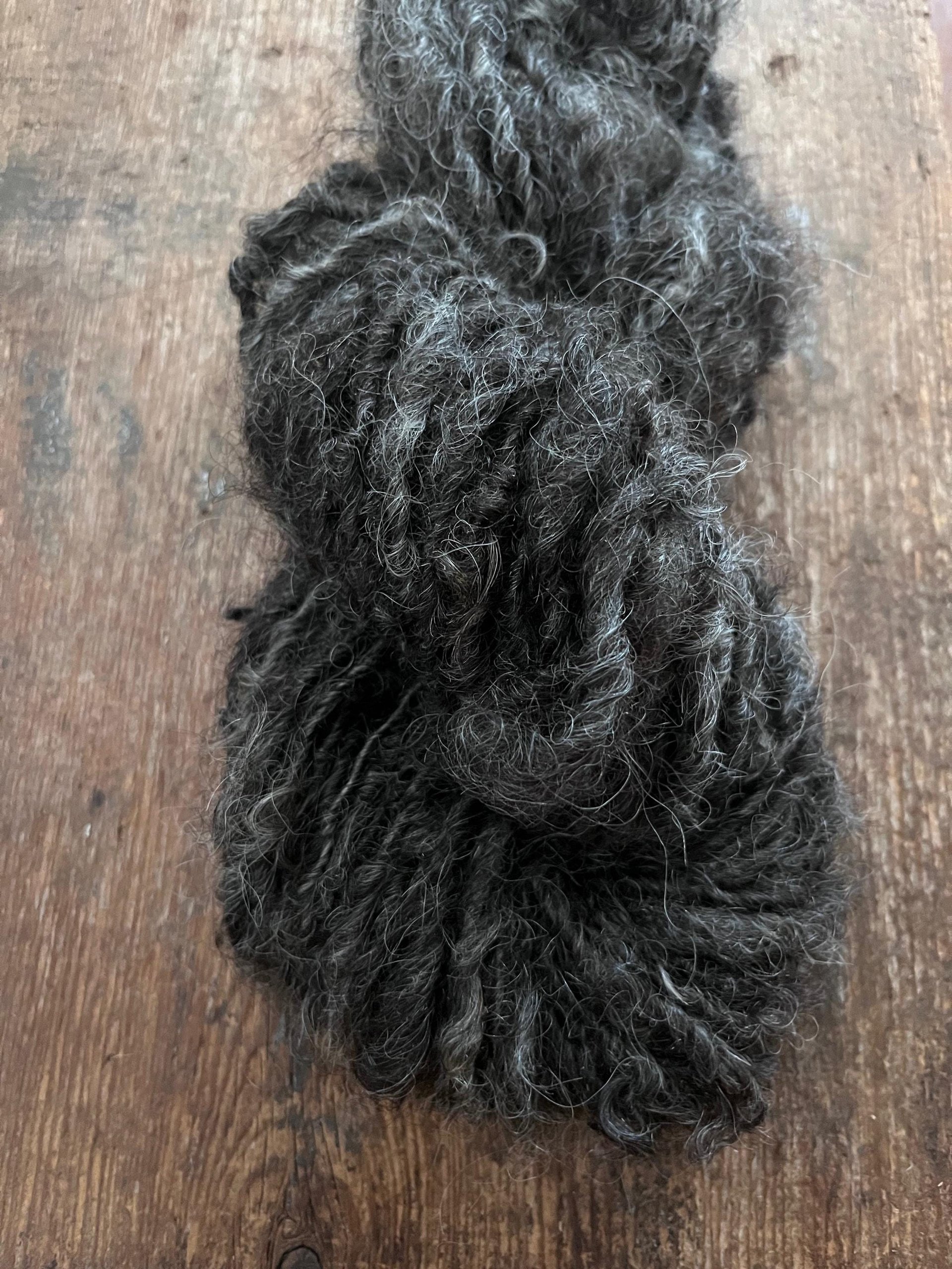Charcoal grey Lincoln wool yarn, lockspun curly art yarn