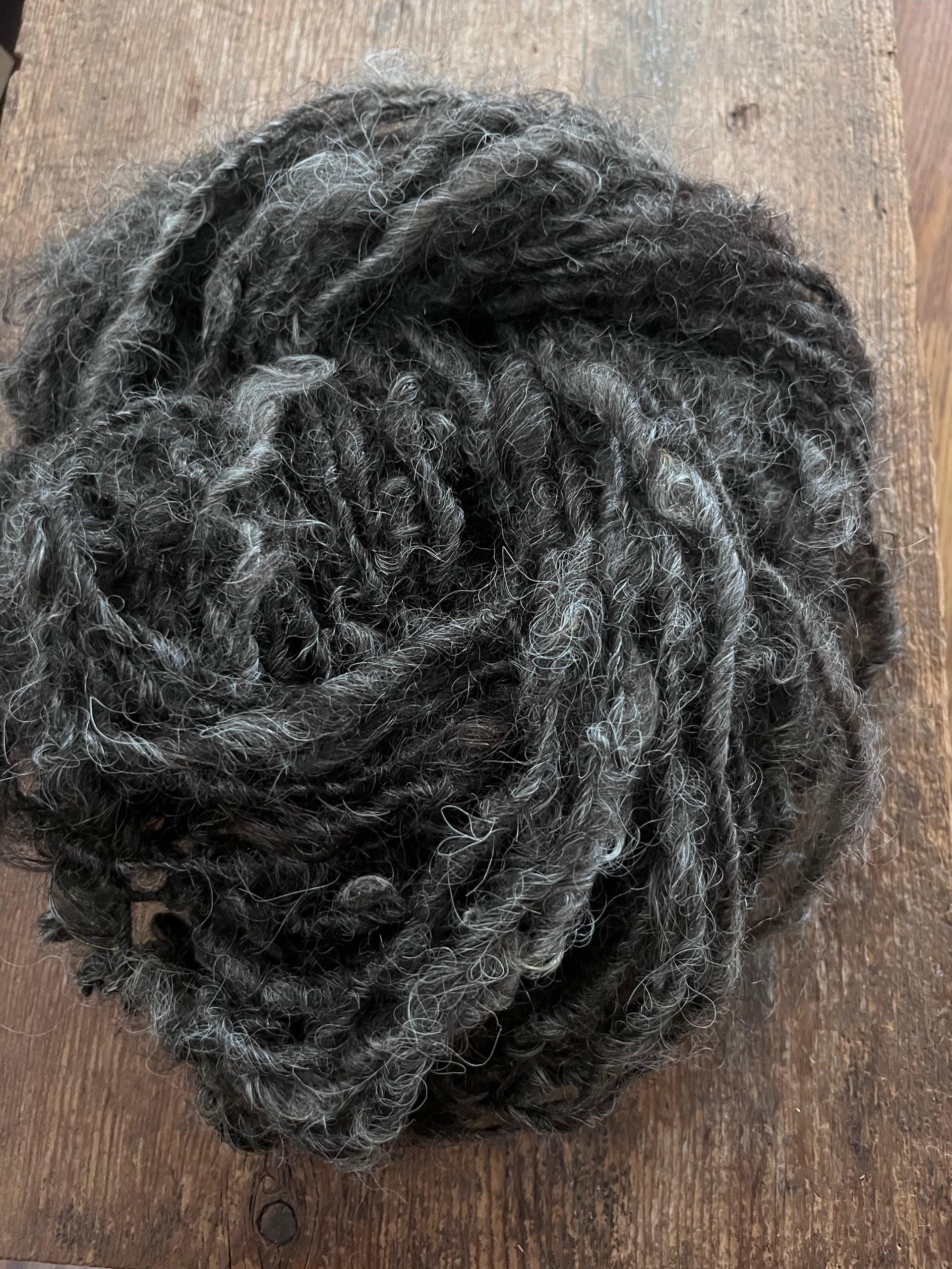 Charcoal grey Lincoln wool yarn, lockspun curly art yarn