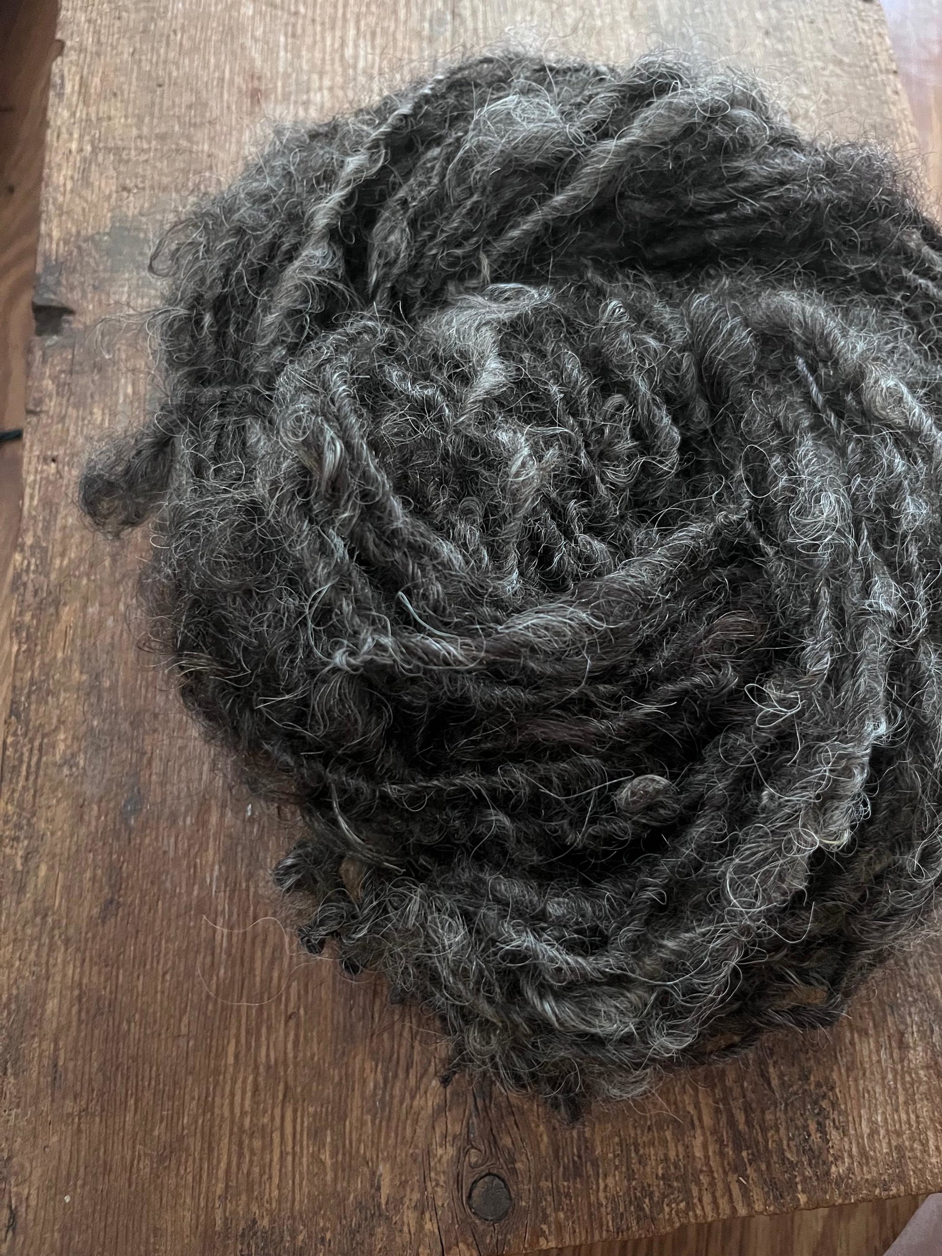 Charcoal grey Lincoln wool yarn, lockspun curly art yarn