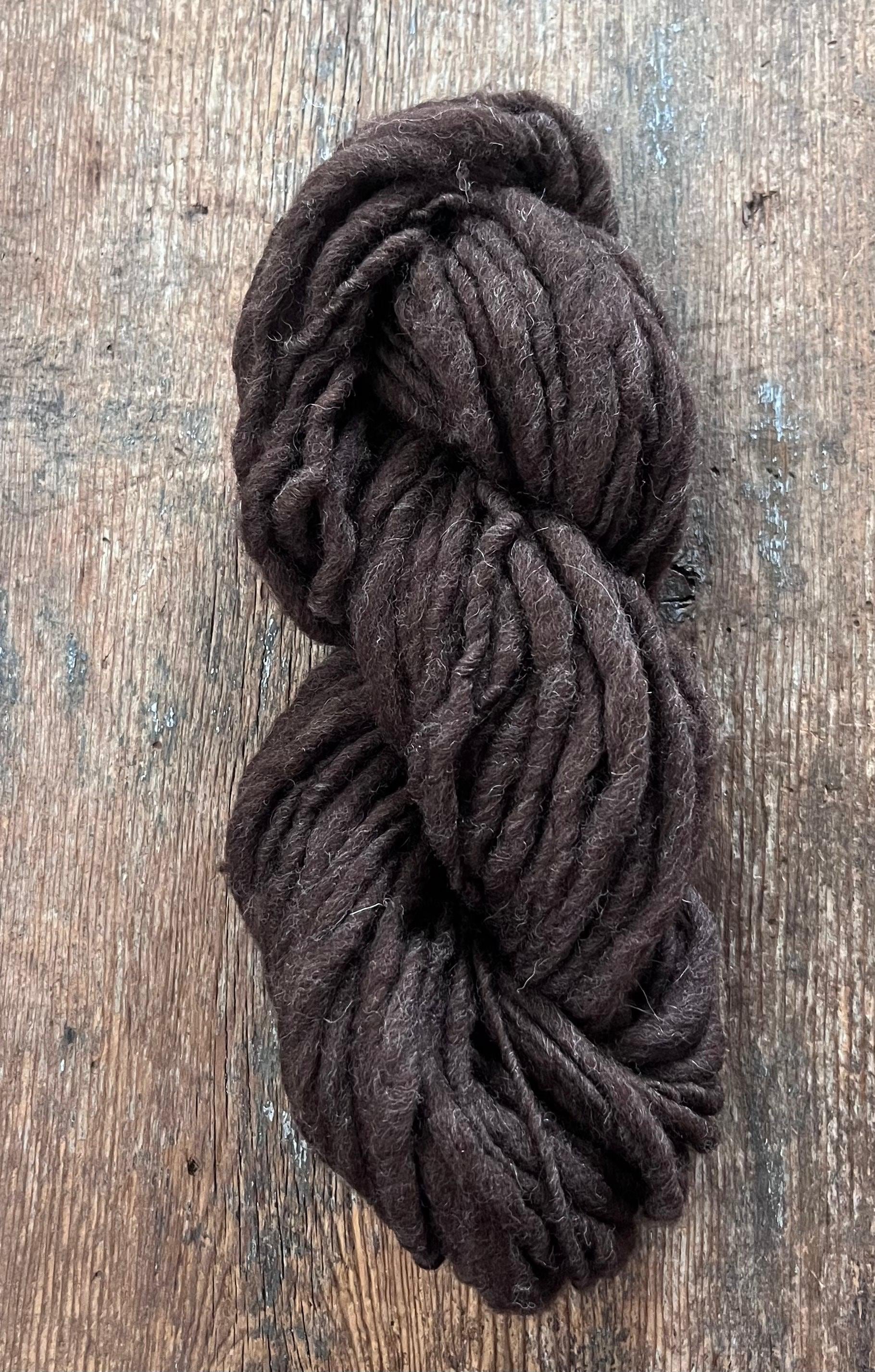 Dark brown Falkland wool, handspun bulky weight. Soft and squishy