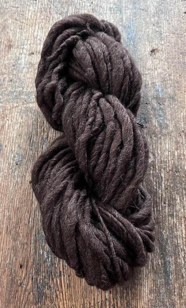 Dark brown Falkland wool, handspun bulky weight. Soft and squishy